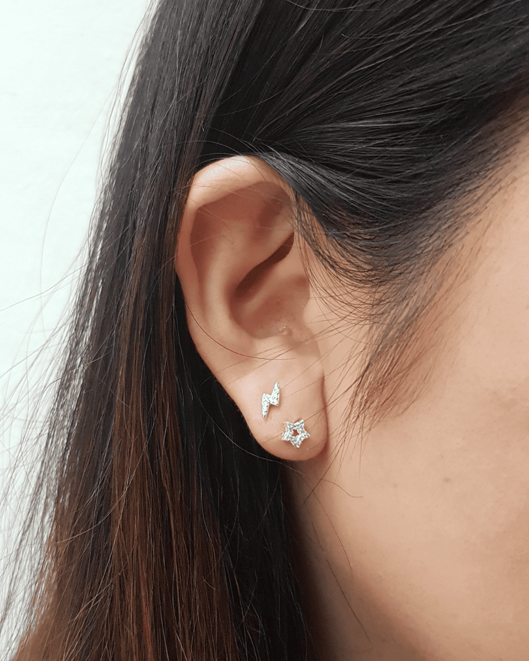 BRINCO ESTRELA ZIRCÔNIAS VAZADO PEQUENO DE PRATA 925