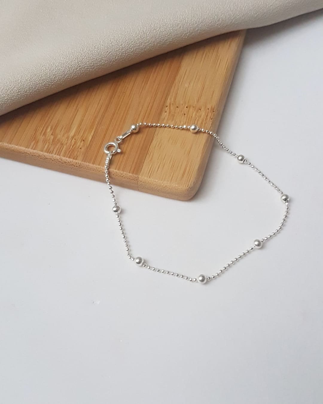 PULSEIRA BOLINHAS DIAMANTADAS PRATA 925