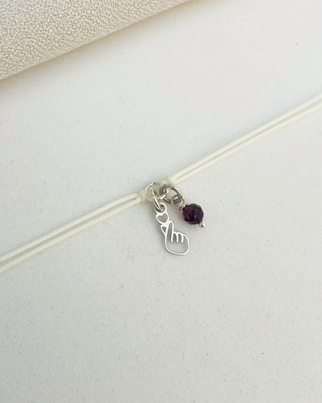 PULSEIRA CORAÇÃO DORAMA CORDÃO CREME E PRATA 925