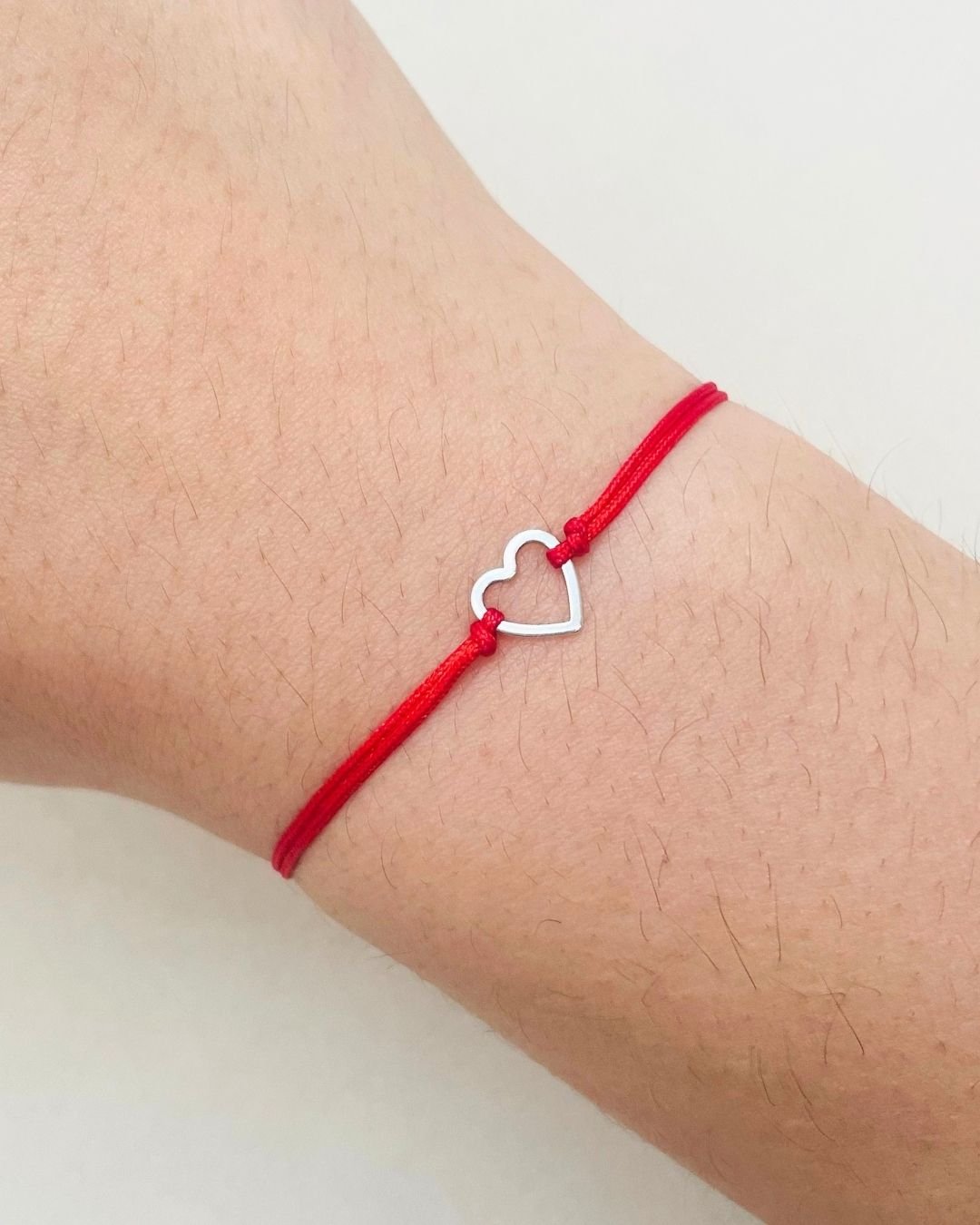 PULSEIRA CORAÇÃO VAZADO CORDÃO VERMELHO E PRATA 925