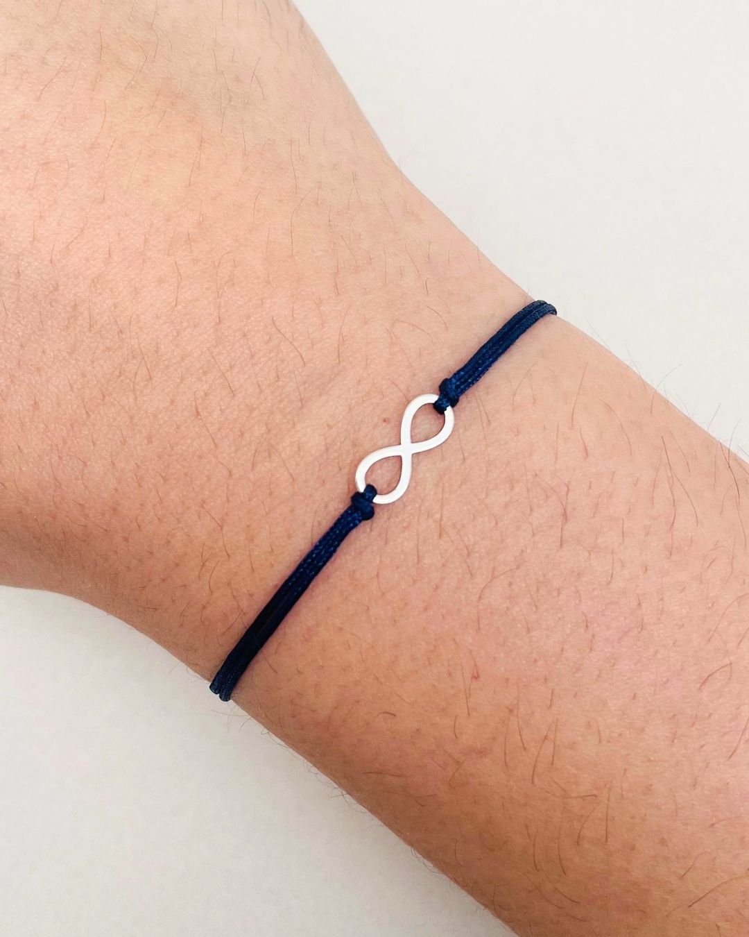 PULSEIRA INFINITO VAZADO CORDÃO AZUL E PRATA 925