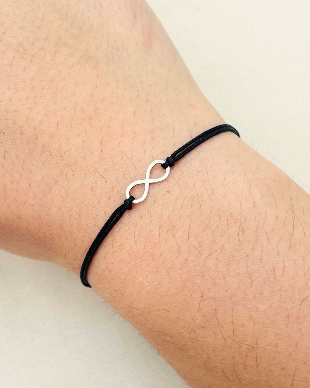PULSEIRA INFINITO VAZADO CORDÃO PRETO E PRATA 925