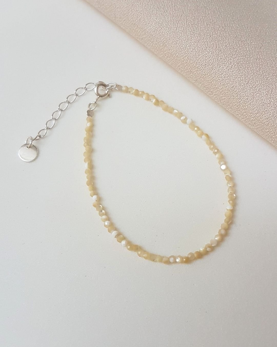 PULSEIRA MADREPÉROLA LAPIDADA 2MM E PRATA 925