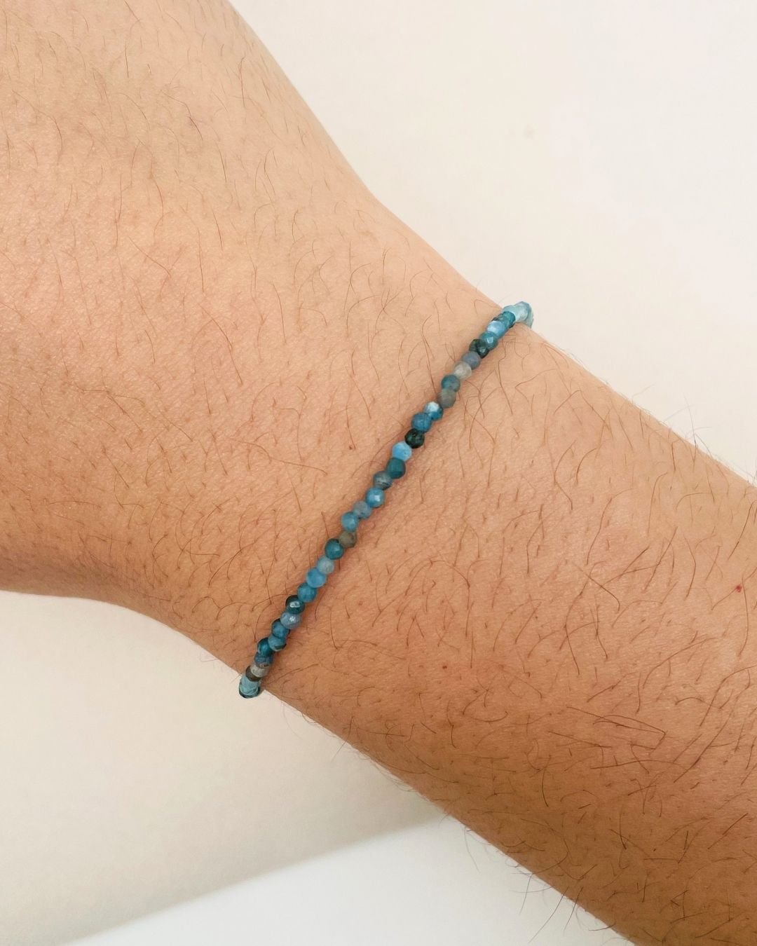 PULSEIRA PEDRAS APATITAS LAPIDADAS 2MM ESCURA