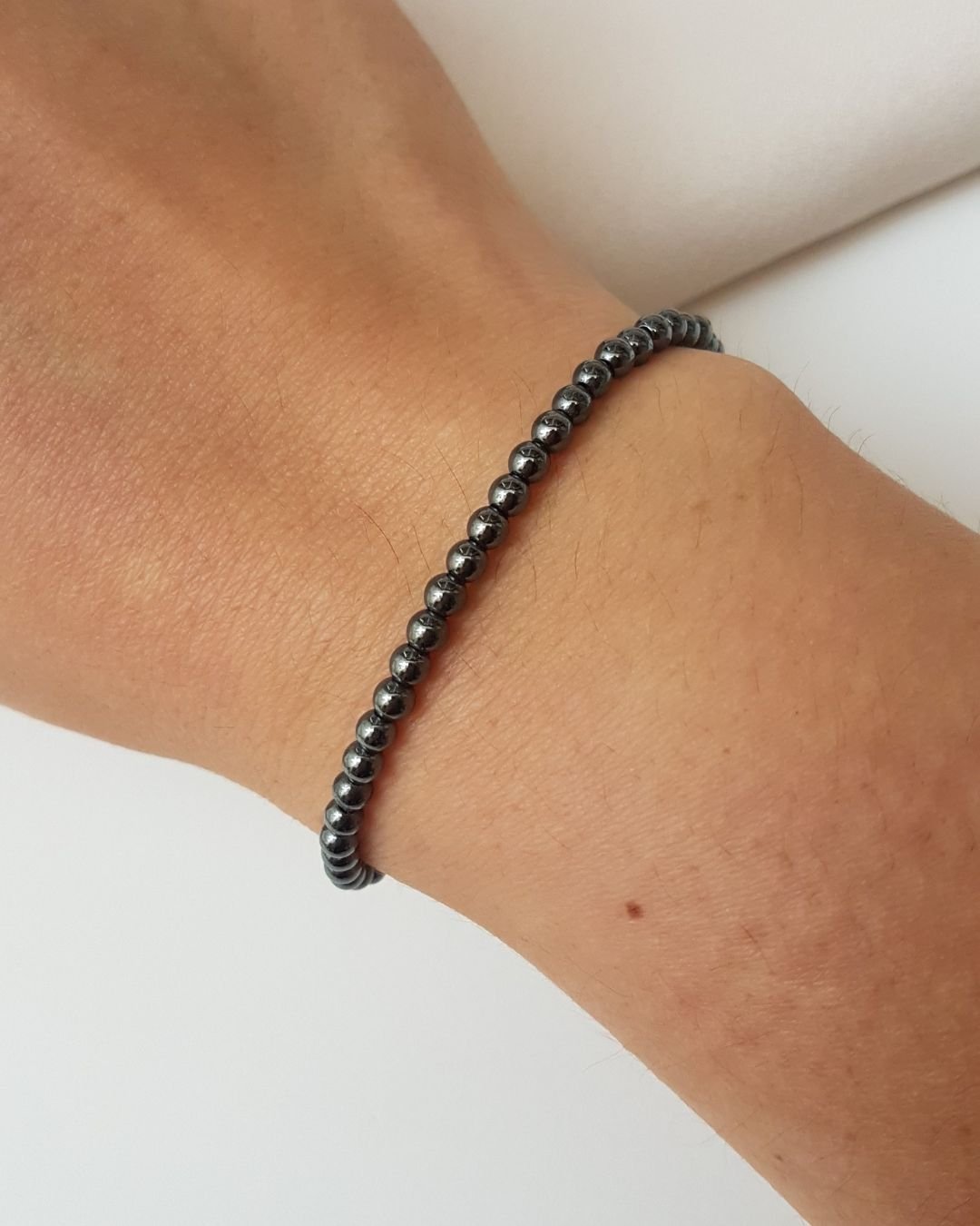 PULSEIRA PEDRAS HEMATITAS BOLINHAS 3MM E PRATA 925